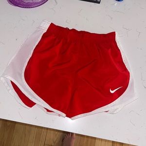 Red Nike shorts